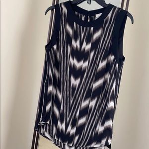 FRNCH top. Lightly used. Modern motif.